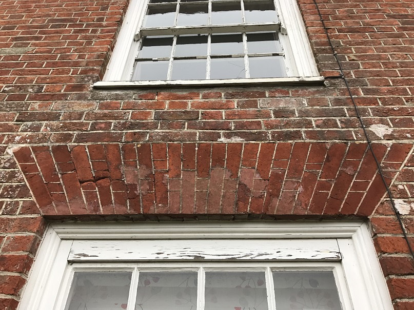 Rubbed brick arch in poor condition