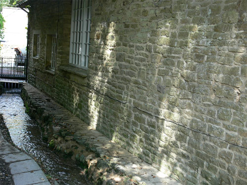 Repaired stone wall