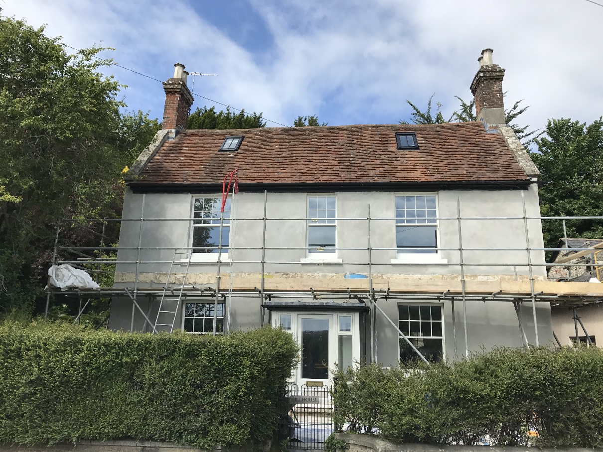 Lime render on brick